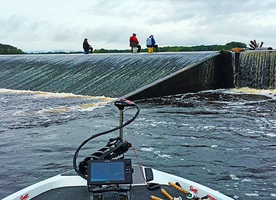 Spillways are common on the Upper Mississippi. Check out the brave anglers fishing for perch.