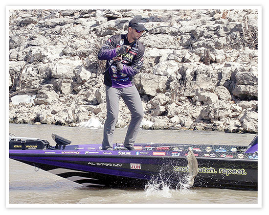 Nationally known bass pro Aaron Martens has been deeply involved in the design and testing of Gamakatsu's new lineup of super sharp "G. Finnese" hooks. Here he gets a hook into a good one.