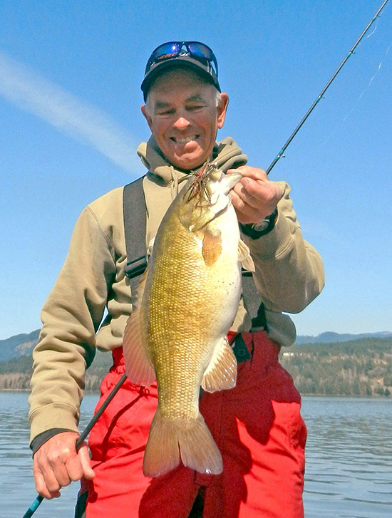 The Pacific Northwest's top bass anglers know how productive the Columbia River can be for smallmouth bass. Pictured with a dandy is Renaud Pelletier, a veteran tournament pro who has qualified for the Bassmasters Classic three times.