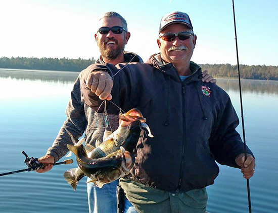 Clark Reehm and Albert Collins show off an A-Rig double from an East Texas lake.