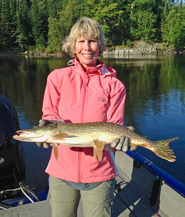 Leslie Hartman holds a beautiful northern pike.