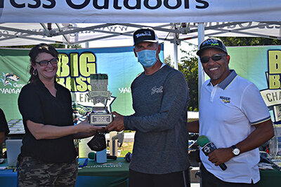 Lindsey Cuccia presents Dan Fonte with the Andy “Cooch” Cuccia Memorial Big Bass Award for his overall big bass of the tournament - 12.96