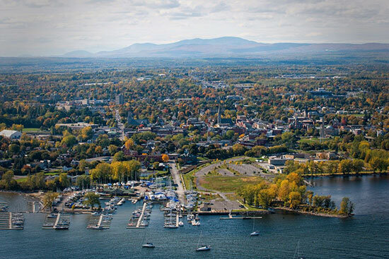 A view of Plattsburgh City Marina with the Adirondack Mountains in the backround.