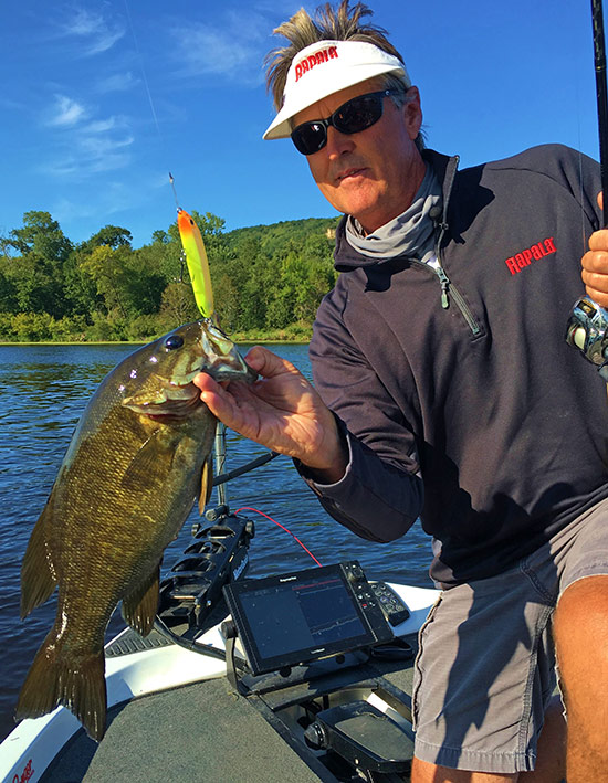 Nice smallmouth like this fell for a Rapala Skitter V near high current areas.